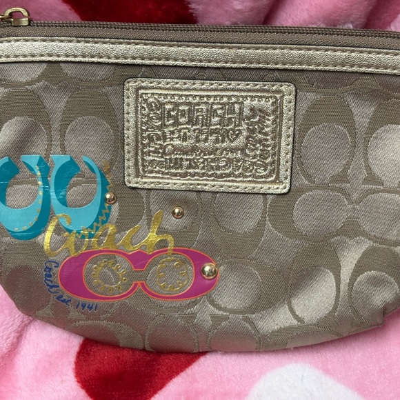 Coach Poppy Tan Wristlet with Gold Accents - Picture 2 of 3